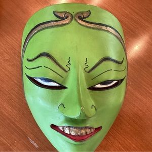 Indonesian hand painted on coconut. Lime green.